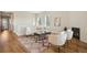 Spacious living room with fireplace, area rug, and hardwood flooring at 5930 S Platte Canyon Dr, Littleton, CO 80123