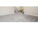 Open concept with a living area and kitchenette in the finished basement at 5930 S Platte Canyon Dr, Littleton, CO 80123