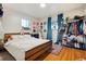 Cozy bedroom with a large bed, bright windows, and stylish decor that creates a peaceful and inviting retreat at 2125 S Gilpin St, Denver, CO 80210