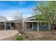 Charming single-story home with a covered parking area and a well-kept front yard in a tranquil neighborhood at 2125 S Gilpin St, Denver, CO 80210