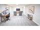 Spacious finished basement with a seating area and a work area at 7100 Saulsbury St, Arvada, CO 80003