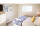 Cozy bedroom with natural light and comfortable furnishings is the perfect space to relax at 7100 Saulsbury St, Arvada, CO 80003