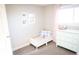 Cozy bedroom with a toddler bed, a dresser, and neutral decor at 7100 Saulsbury St, Arvada, CO 80003