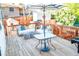 Inviting deck with comfortable seating, a glass-topped table, and a peaceful outdoor space for relaxing and entertaining at 7100 Saulsbury St, Arvada, CO 80003
