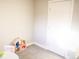 Simple playroom with a dollhouse and a bright atmosphere at 7100 Saulsbury St, Arvada, CO 80003