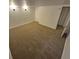 Large basement room with carpet flooring at 14190 E Gunnison Pl, Aurora, CO 80012