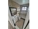 Bathroom featuring tiled walls, a shower/tub combination and a vanity at 14190 E Gunnison Pl, Aurora, CO 80012