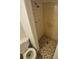 Tiled shower and toilet at 14190 E Gunnison Pl, Aurora, CO 80012