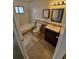 Bathroom with a combination shower and tub, vanity, and decorative tile at 14190 E Gunnison Pl, Aurora, CO 80012