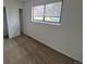 Bedroom with carpeted floors, a closet and a window at 14190 E Gunnison Pl, Aurora, CO 80012