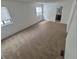 A bedroom with carpet, windows, and a bathroom attached at 14190 E Gunnison Pl, Aurora, CO 80012