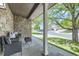 Covered front porch with comfortable seating and a view of the neighborhood, perfect for relaxing at 11218 Newark Ct, Commerce City, CO 80640