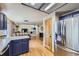 Modern kitchen with stainless steel appliances and an open floor plan at 11218 Newark Ct, Commerce City, CO 80640