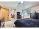 Large main bedroom with modern furnishings and an ensuite bathroom at 11218 Newark Ct, Commerce City, CO 80640