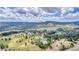 Aerial view of an estate nestled in a mountain community at 28 Indian Paintbrush Dr, Golden, CO 80401