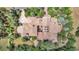 Gorgeous aerial view of the property with lush landscaping, tile roof, and peaceful backyard at 28 Indian Paintbrush Dr, Golden, CO 80401