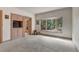 Bright bedroom with large windows, a built-in cabinet, and ample natural light at 28 Indian Paintbrush Dr, Golden, CO 80401
