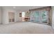 Spacious bedroom with a balcony and a seating area, offering a relaxing retreat at 28 Indian Paintbrush Dr, Golden, CO 80401