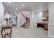 Grand foyer featuring an ornate staircase and elegant decor, creating a welcoming entrance at 28 Indian Paintbrush Dr, Golden, CO 80401