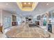 Spacious kitchen with a large island and stone countertops extends into the living room at 28 Indian Paintbrush Dr, Golden, CO 80401