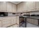 Well-organized laundry room equipped with modern washer and dryer at 28 Indian Paintbrush Dr, Golden, CO 80401