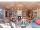 Charming living room with a fireplace, built-in shelves, and decorative accents at 28 Indian Paintbrush Dr, Golden, CO 80401