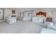 Open main bedroom with seating area, fireplace, and a luxurious, comfortable bed at 28 Indian Paintbrush Dr, Golden, CO 80401