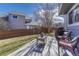 Fenced backyard features a patio, seating area and plenty of grassy area at 1655 Hermosa Dr, Highlands Ranch, CO 80126