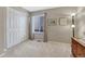 Neutral bedroom with a closet, window, carpeting, and light-brown painted walls at 1655 Hermosa Dr, Highlands Ranch, CO 80126