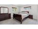 Bright bedroom featuring classic furniture and soft natural light at 2112 S Olathe St, Aurora, CO 80013