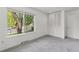 Neutral bedroom with large window and ample closet space at 2112 S Olathe St, Aurora, CO 80013