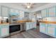 Stylish kitchen featuring stainless appliances and wood countertops at 2112 S Olathe St, Aurora, CO 80013
