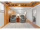 Living room with wood floors, a patterned rug, comfortable chairs, and stylish lighting at 2112 S Olathe St, Aurora, CO 80013