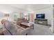 Inviting living room with a large window and cozy seating at 2112 S Olathe St, Aurora, CO 80013