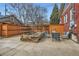 Backyard with a garden bed, stone patio, and seating area at 579 S Sherman St, Denver, CO 80209