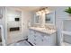 Stylish bathroom with a double vanity, wood flooring, and contemporary decor at 579 S Sherman St, Denver, CO 80209