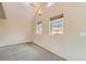 Bright bedroom featuring neutral walls, carpet, and two windows for natural light at 579 S Sherman St, Denver, CO 80209