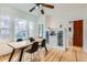 Bright dining room includes hardwood floors, windows, and classic built-in cabinets at 579 S Sherman St, Denver, CO 80209