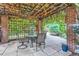 Outdoor patio area with a pergola, string lights, and seating at 579 S Sherman St, Denver, CO 80209