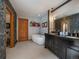 Luxurious bathroom boasting double sinks, modern vanity, and a freestanding bathtub at 31518 Niakwa Rd, Evergreen, CO 80439