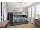 bedroom features a gray bunkbed with built-in drawers and a ceiling fan at 10397 Helsinki St, Parker, CO 80134