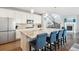 This kitchen is the focal point, connecting to a Gathering room and an ornate stairwell at 10397 Helsinki St, Parker, CO 80134