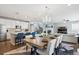 The large kitchen and dining space connects to the Gathering room for seamless entertaining at 10397 Helsinki St, Parker, CO 80134
