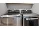 New laundry room equipped with front load LG washer and dryer sets at 10397 Helsinki St, Parker, CO 80134