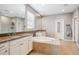 Luxurious bathroom featuring double vanities, a soaking tub, and elegant finishes for a serene atmosphere at 10397 Helsinki St, Parker, CO 80134