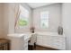 Charming office space with built-in desk, ample storage, and natural light at 10397 Helsinki St, Parker, CO 80134