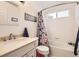 Clean bathroom with tub, shower, and updated vanity at 10491 Tiger Run, Lone Tree, CO 80124