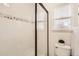 Updated bathroom with a shower/tub combo at 10491 Tiger Run, Lone Tree, CO 80124