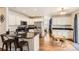 Kitchen with white cabinets, granite countertops, and stainless steel appliances at 10491 Tiger Run, Lone Tree, CO 80124