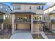 Modern two-story home boasts a stone facade, covered porch, and attached two-car garage at 15624 W Floyd Dr, Morrison, CO 80465